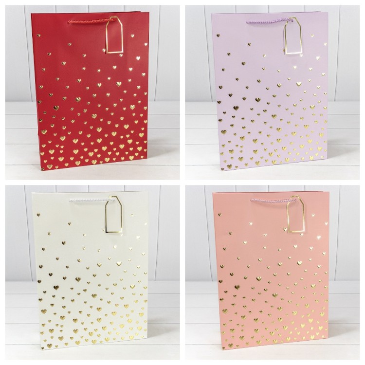 Пакет подарочный с тиснением "Сердечки" (микс 1) 31*42*12 210г 1/20 1/80 Арт: 000880A